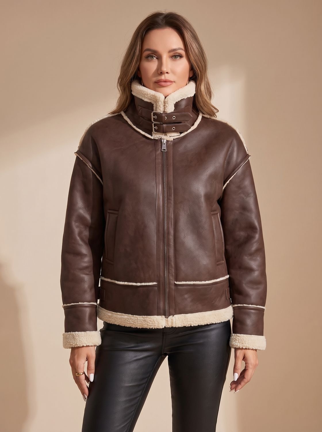 Victoria Brown faux leather aviator jacket with buckled high collar, faux shearling trim, full front zipper, long sleeves, and side pockets