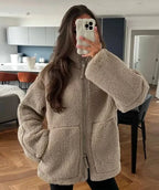 Victoria Brown plush teddy fleece jacket featuring a high collar, full front zipper, roomy sleeves, and convenient front pockets