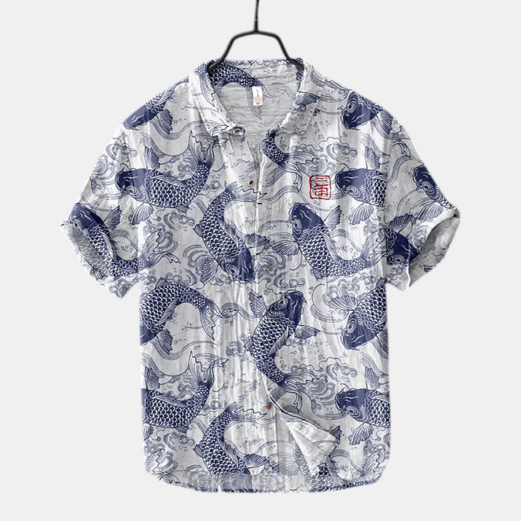 Front view of the Vintage Fish-Print Linen Shirt in blue, featuring a band collar, short sleeves, button-front closure, and a vintage-inspired fish print. Designed by Bella Hudson.