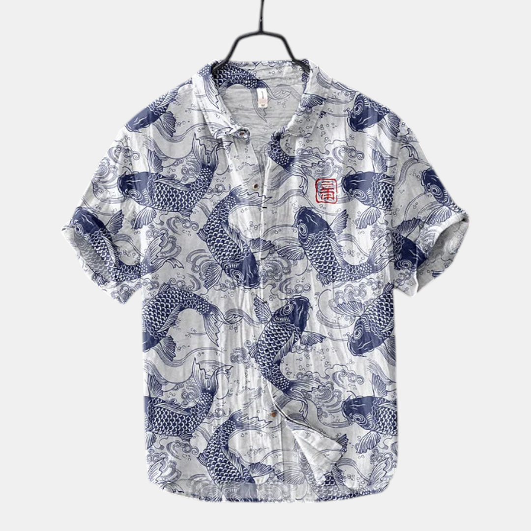 Front view of the Vintage Fish-Print Linen Shirt in blue, featuring a band collar, short sleeves, button-front closure, and a vintage-inspired fish print. Designed by Bella Hudson.