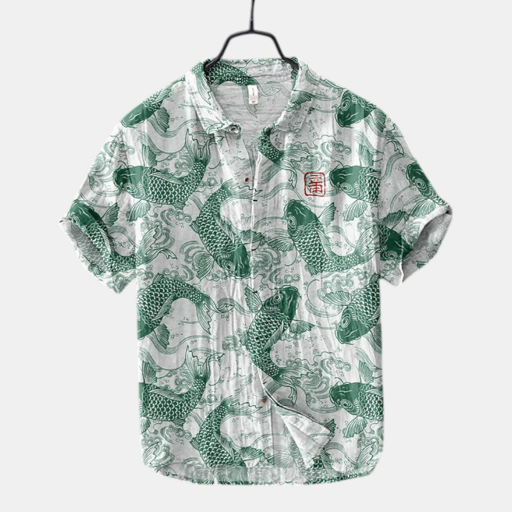 Front view of the Vintage Fish-Print Linen Shirt in green, featuring a band collar, button-front design, short sleeves, and a breathable linen-blend fabric with a fish print. Designed by Bella Hudson.