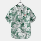 Front view of the Vintage Fish-Print Linen Shirt in green, featuring a band collar, button-front design, short sleeves, and a breathable linen-blend fabric with a fish print. Designed by Bella Hudson.