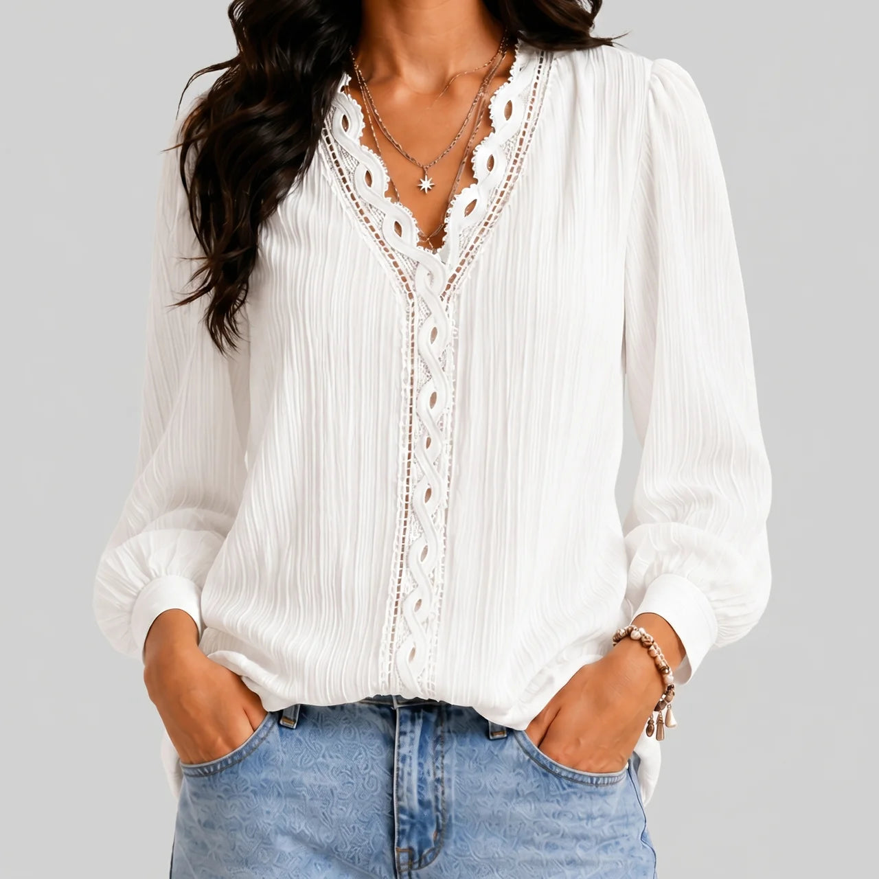 Front view of white boho button blouse with long sleeves and textured fabric by BELLA HUDSON