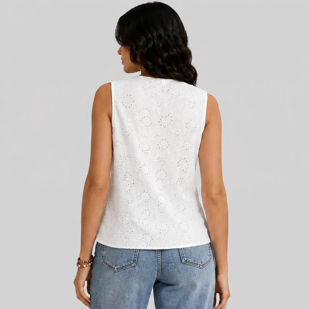Back view of white eyelet button vest blouse with sleeveless tailored fit by BELLA HUDSON
