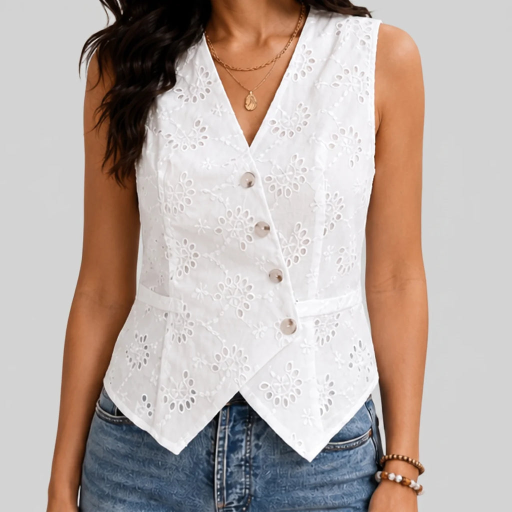 Front view of white eyelet button vest blouse with sleeveless tailored fit by BELLA HUDSON