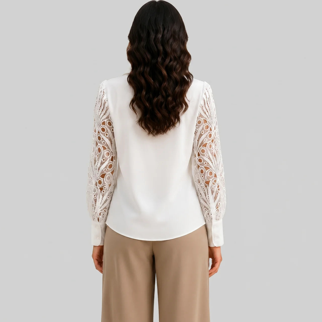 Back view of white lace sleeve blouse with long crochet sleeves and collared neckline by BELLA HUDSON