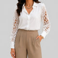 Front view of white lace sleeve blouse with long crochet sleeves and collared neckline by BELLA HUDSON