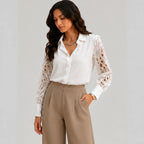 Side view of white lace sleeve blouse with long crochet sleeves and collared neckline by BELLA HUDSON