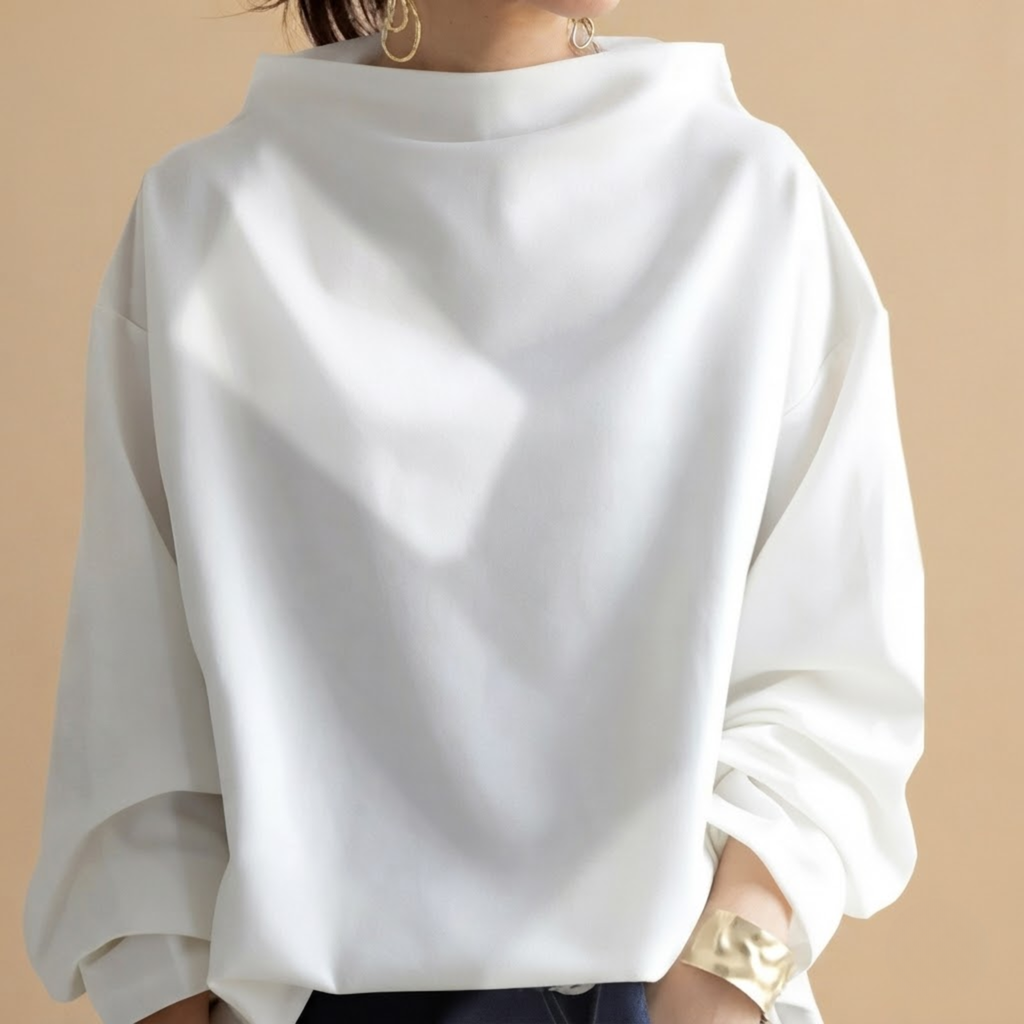 Front view of the Wilhelmina Blouse Draped High-Neck Long-Sleeve in White, featuring a draped silhouette, high neckline, and long sleeves.