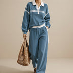 Front view of the Wilhelmina Two-Piece Set Striped Polo Wide-Leg in Blue, featuring a striped polo top and relaxed wide-leg pants.