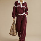 Front view of the Wilhelmina Two-Piece Set Striped Polo Wide-Leg in Red, featuring a striped polo top and relaxed wide-leg pants.