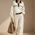 Front view of the Wilhelmina Two-Piece Set Striped Polo Wide-Leg in White, featuring a striped polo top and wide-leg pants.