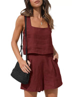 Front view of the Wilhelmina Two-Piece Set Tank Shorts in burgundy, featuring a sleeveless square-neck tank top with button details and matching relaxed shorts. Designed by Charlier Paris.