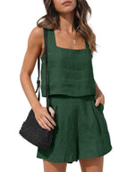 Front view of the Wilhelmina Two-Piece Set Tank Shorts in dark green, featuring a sleeveless square-neck tank top with button details and matching high-waisted shorts. Designed by Charlier Paris.