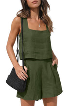 Front view of the Wilhelmina Two-Piece Set Tank Shorts in olive green, featuring a sleeveless square-neck tank top with button details and matching relaxed shorts. Designed by Charlier Paris.