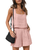 Front view of the Wilhelmina Two-Piece Set Tank Shorts in pink, featuring a sleeveless square-neck tank top with button details and matching high-waisted shorts with a relaxed fit. Designed by Charlier Paris.