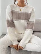 Willa White ribbed crewneck sweater with horizontal contrast stripes and relaxed fit, styled with pants
