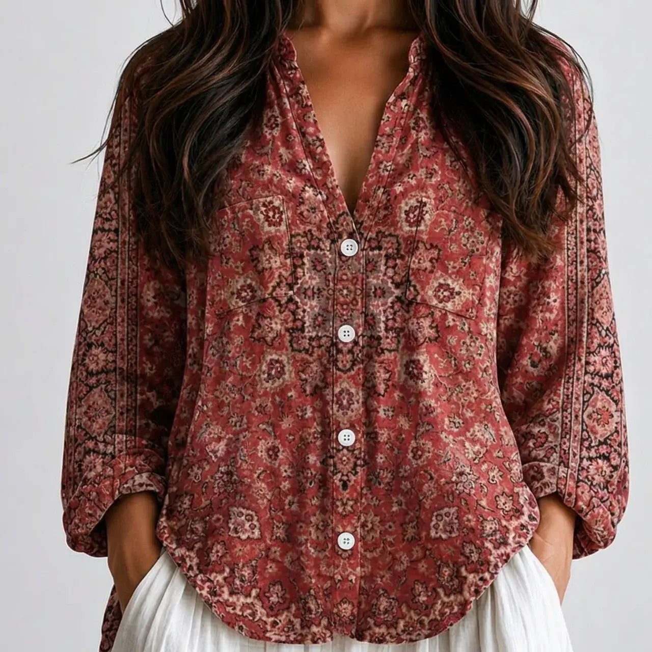 Close-up of rusk embroidered boho blouse trim detail BELLA HUDSON