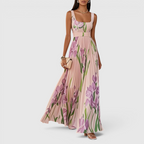Front view of the Winnie Maxi Cocktail Dress Floral-Print Chiffon Square-Neck in pink, featuring a square neckline, sleeveless design, fitted bodice, flowing chiffon skirt, and a romantic floral-print silhouette. Designed by Bella Hudson.