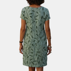 Back view of the Winnie Shift Dress Leaf-Print Lightweight Short-Sleeve in green, highlighting the relaxed shift silhouette, short sleeves, and all-over leaf print. Designed by Bella Hudson.