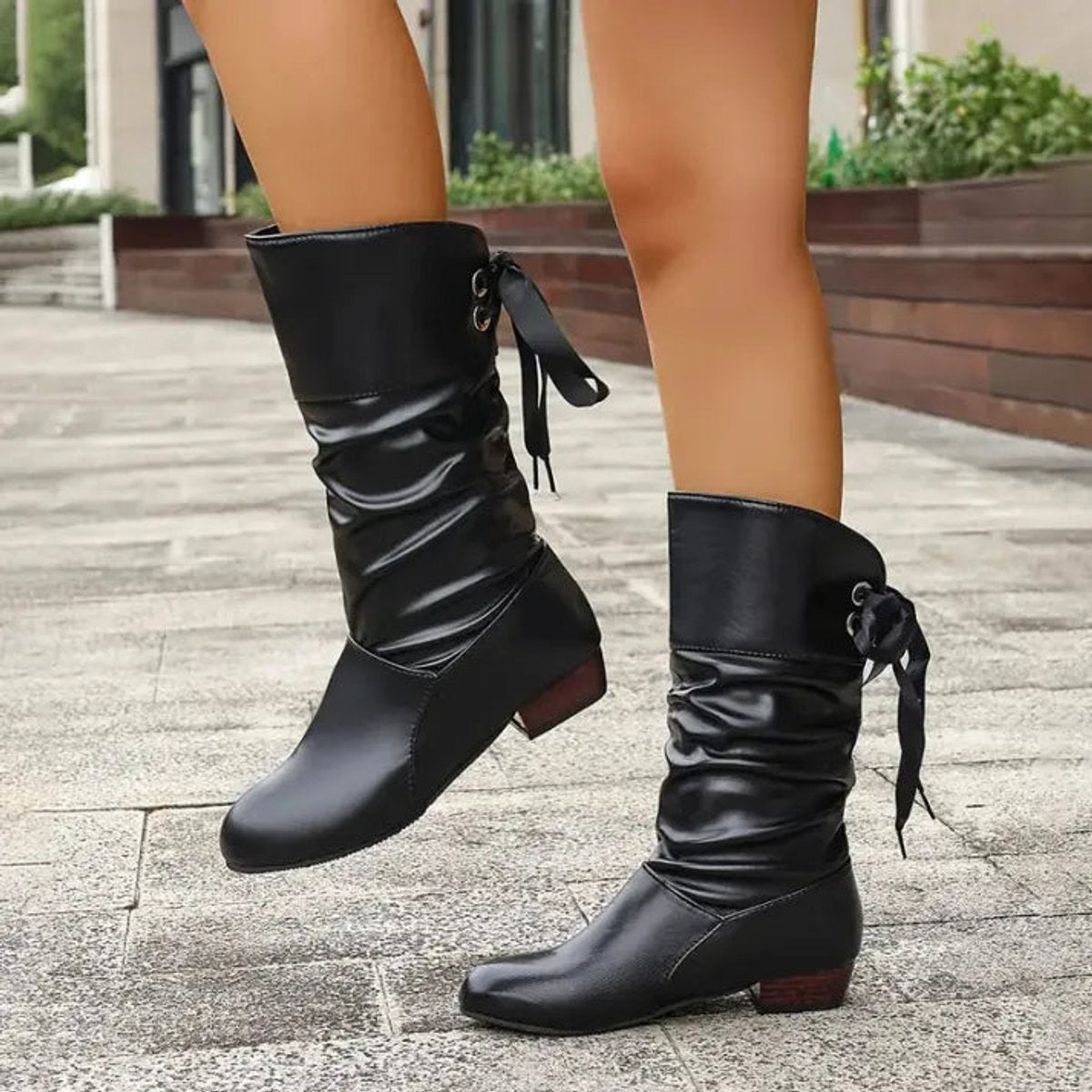 Winslow faux leather mid-calf lace-up boots, sole view