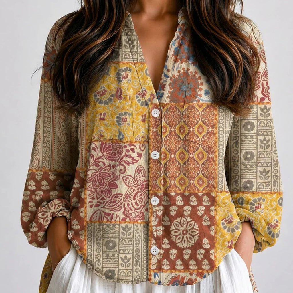 Close-up front view of multicolor patchwork floral boho lightweight blouse with button front and long sleeves BELLA HUDSON.


