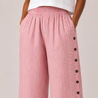 Detailed view of Woman's Lightweight Pants with Button Design highlighting striped texture, button accents, and quality craftsmanship, designed by Bella Hudson