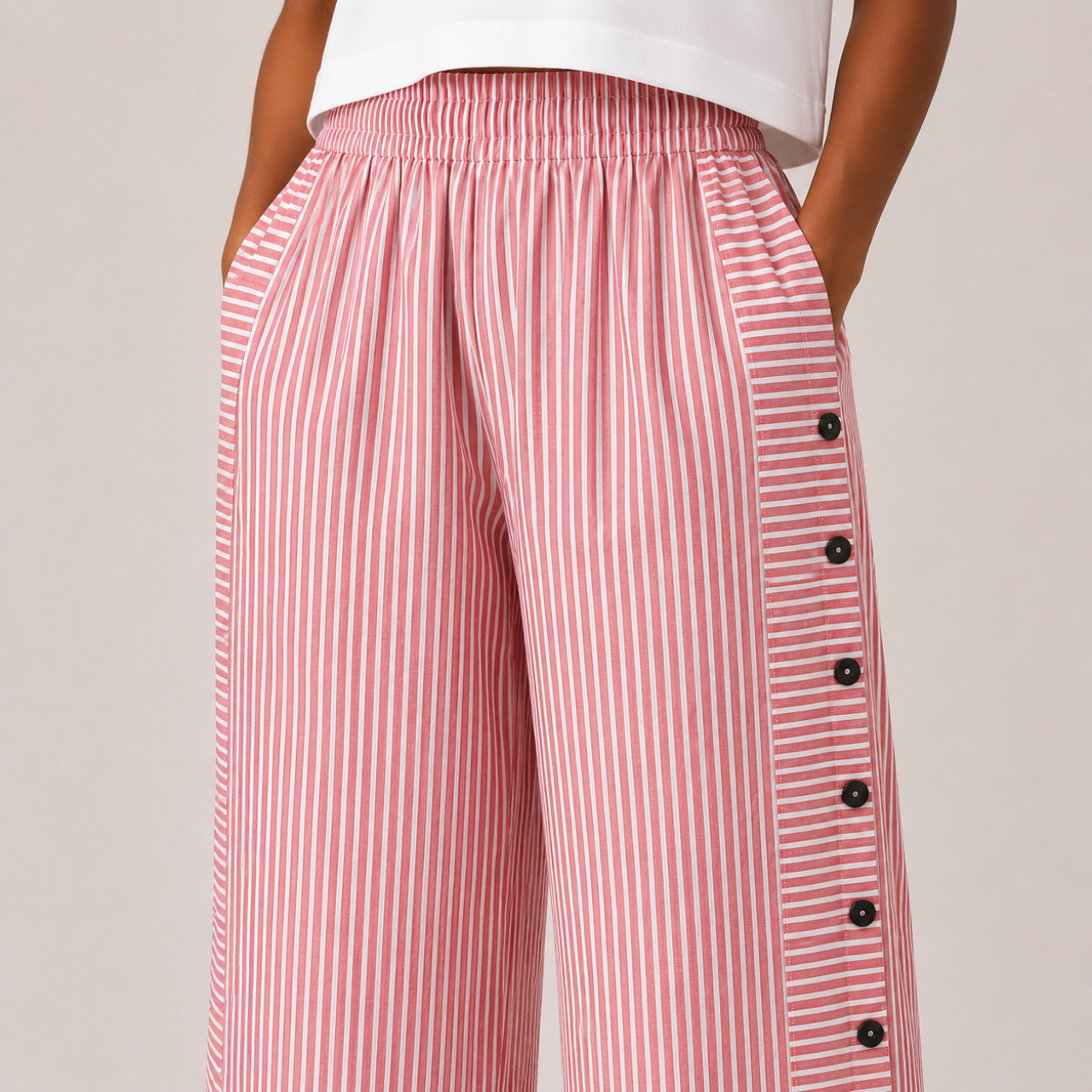 Detailed view of Woman's Lightweight Pants with Button Design highlighting striped texture, button accents, and quality craftsmanship, designed by Bella Hudson