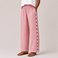 Red front view of Woman's Lightweight Pants with Button Design featuring striped fabric, side button accents, and a relaxed wide-leg fit, designed by Bella Hudson