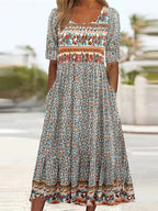Front view of orange womens boho floral print maxi dress by BELLA HUDSON