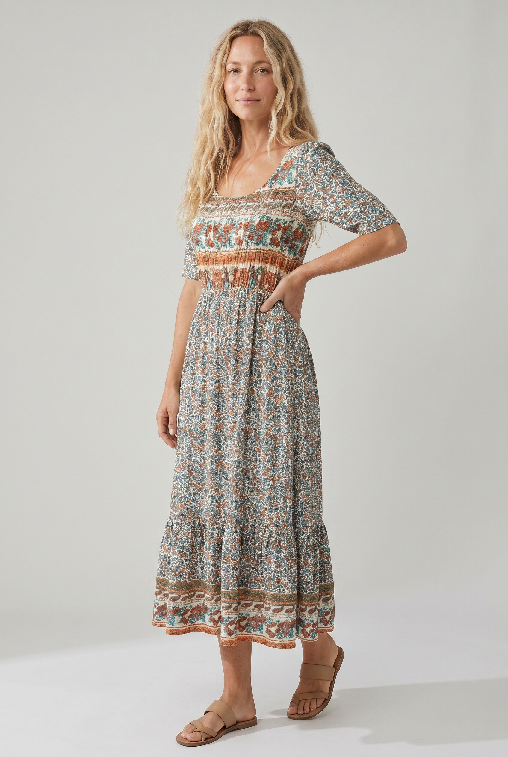 Side view of orange Womens Boho Floral Print Maxi Dress by BELLA HUDSON