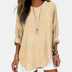 Front view of the Women's Boho Lightweight Blouse in yellow, featuring a relaxed oversized fit, round neckline, rolled three-quarter sleeves, textured fabric, and a curved high-low hem. Designed by Bella Hudson.