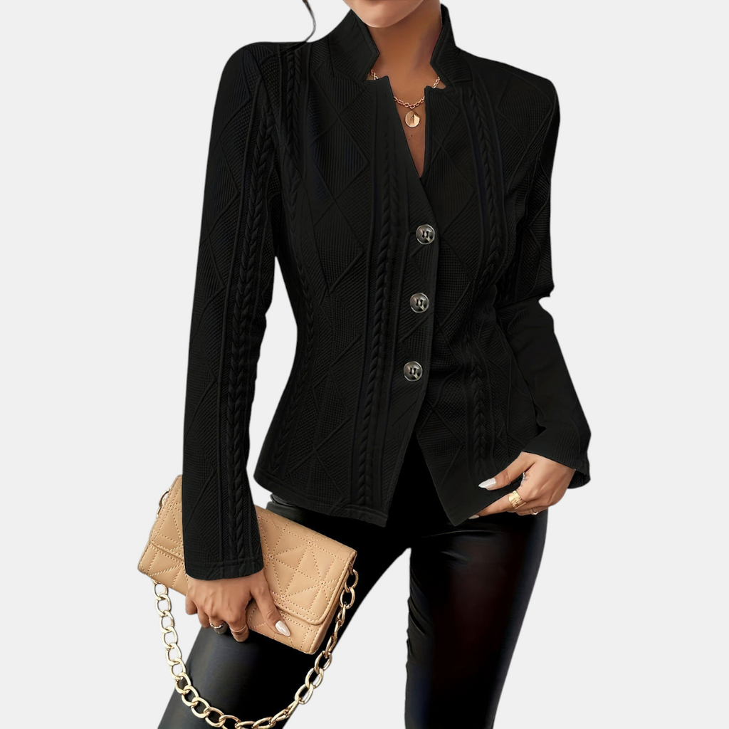 Front view of the Women's Chic Blazer in black, featuring a tailored single-breasted design, notched lapel, button-front closure, and a sleek structured silhouette. Designed by Bella Hudson.