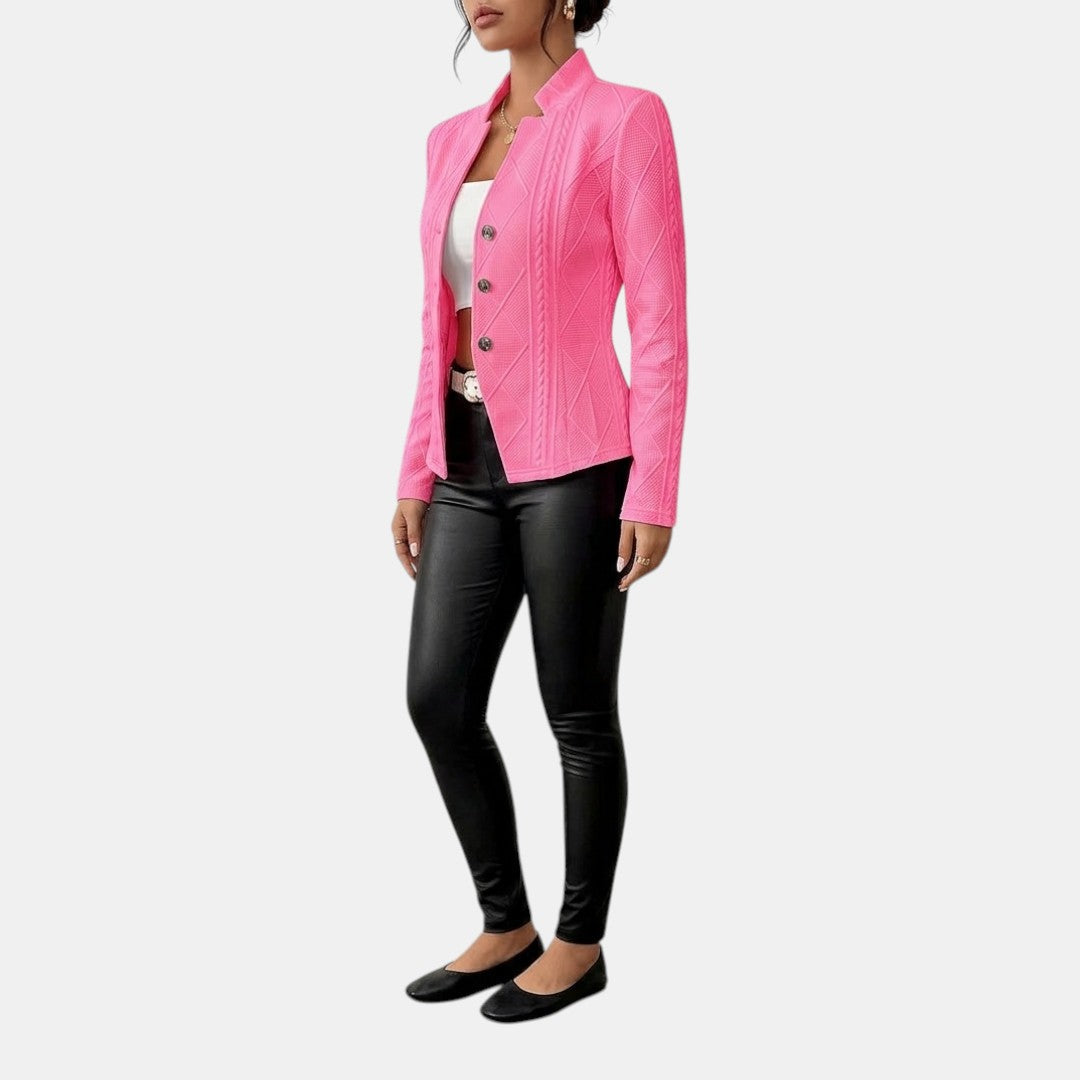 Side view of the Women's Chic Blazer in pink, showcasing the tailored fit, notched lapel, long sleeves, and clean side profile. Designed by Bella Hudson.