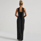Back view of the Women's Cocktail Maxi Dress Bodycon Fit with Styled Scarf in black, highlighting the strapless back, figure-hugging silhouette, and elegant floor-length finish. Designed by Bella Hudson.