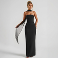 Front view of the Women's Cocktail Maxi Dress Bodycon Fit with Styled Scarf in black, featuring a strapless neckline, bodycon silhouette, floor-length design, and a sheer scarf accent for an elegant evening look. Designed by Bella Hudson.