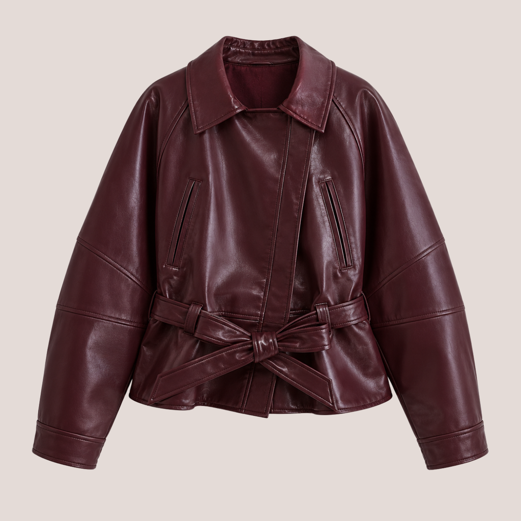 Front view of Women's Cropped Biker Style Faux Leather Jacket in wine red featuring an oversized silhouette, wide collar, belted waist, and premium faux leather finish designed by Bella Hudson.