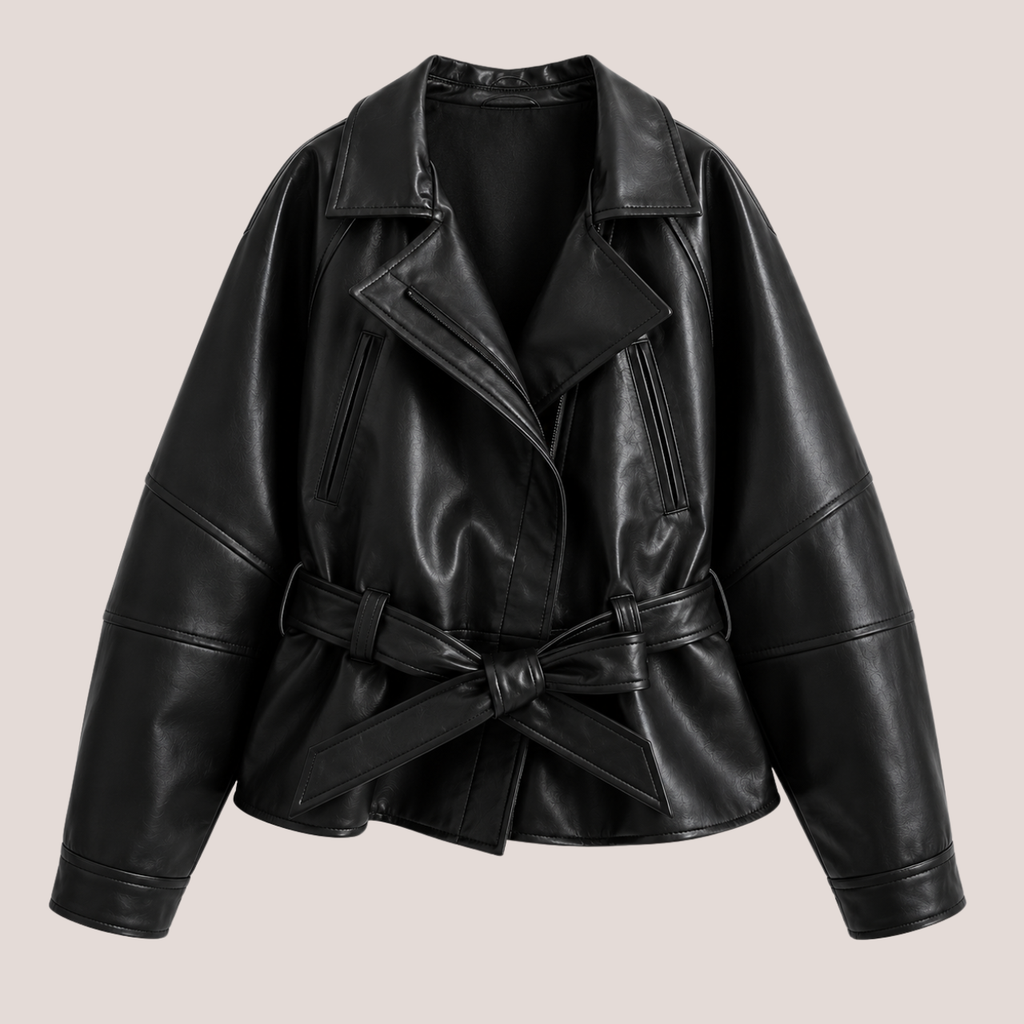 product view of Women's Cropped Biker Style Faux Leather Jacket in wine red highlighting the oversized collar, faux leather texture, stitching details, and waist belt designed by Bella Hudson.