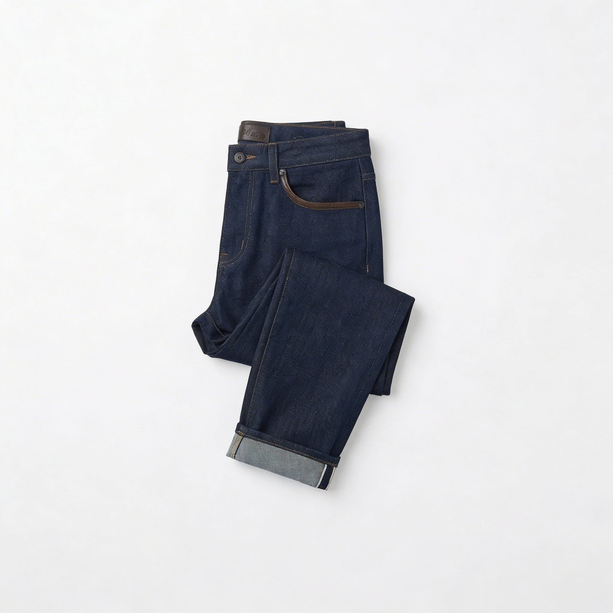 Women's dark blue denim jeans folded angled view with rolled cuffs BELLA HUDSON