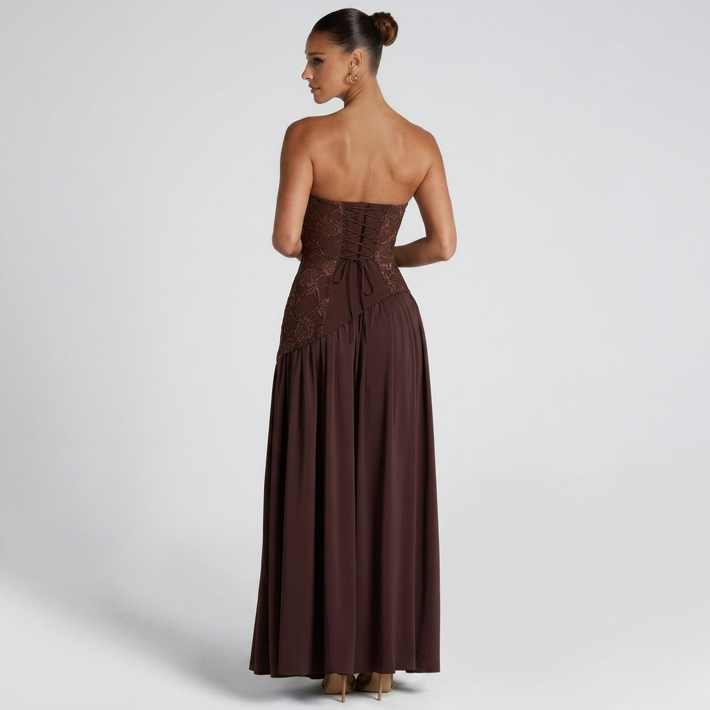 Back view of the Women's Wedding Guest Maxi Dress with a strapless bodice and high-split design in brown, showcasing the clean strapless back, gathered waistline, and graceful full-length silhouette. Designed by Bella Hudson.