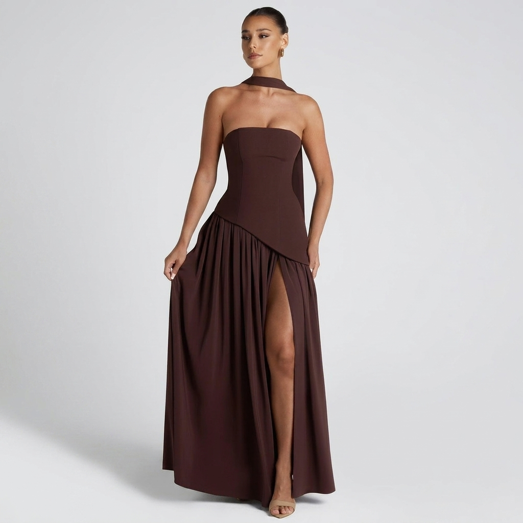 Front view of the Women's Wedding Guest Maxi Dress with a strapless bodice and high-split design in brown, featuring a fitted bandeau-style bodice, gathered waist, flowing maxi skirt, and elegant thigh-high slit for a refined occasion look. Designed by Bella Hudson.