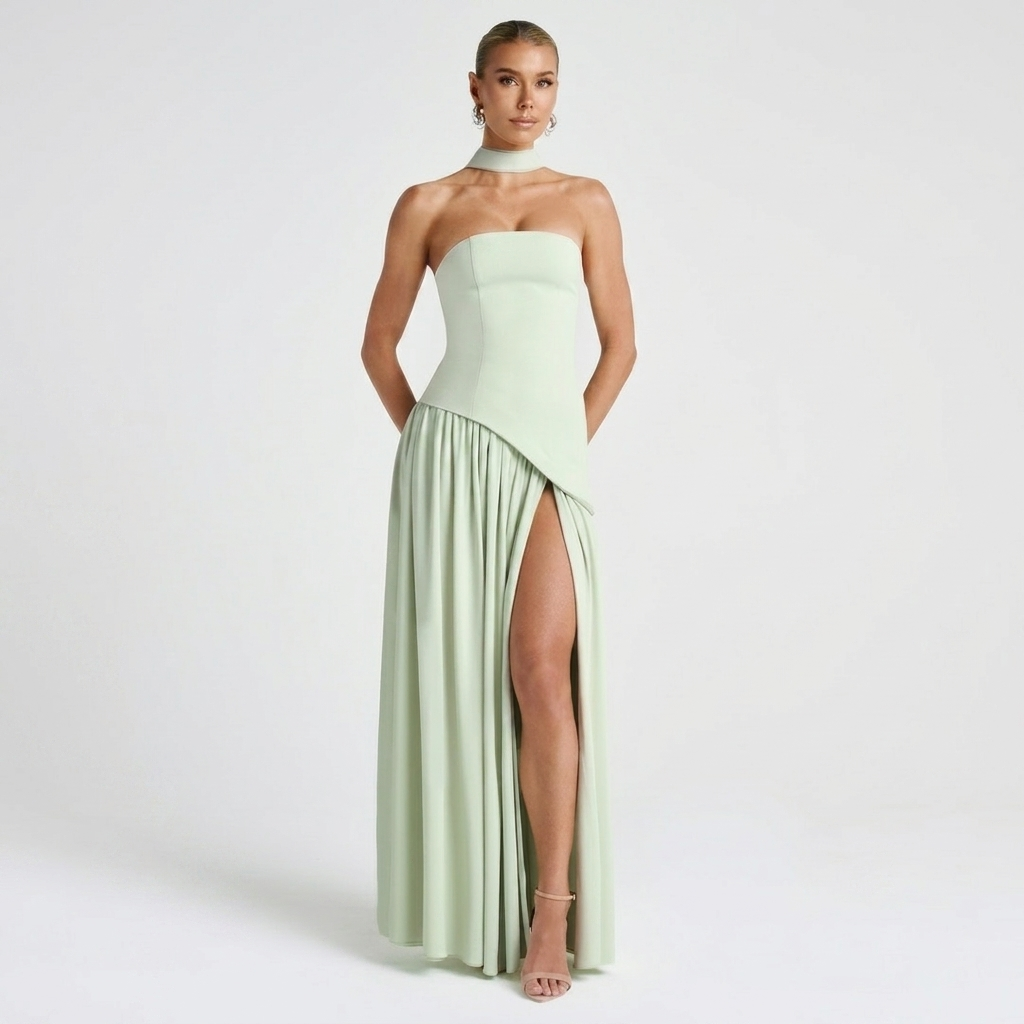 Front view of the Women's Wedding Guest Maxi Dress with a strapless bodice and high-split design in light green, featuring a fitted bandeau bodice, flowing maxi skirt, and dramatic side slit with an elegant silhouette. Designed by Bella Hudson.