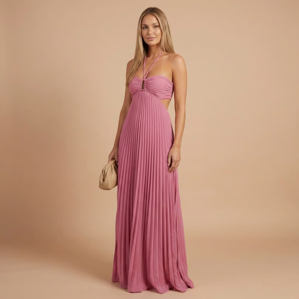 Front view of the Women's Wedding Guest Maxi Dress with a strapless bodice and high-split design in pink, featuring a ruched sweetheart bodice, flowing pleated skirt, and graceful full-length silhouette. Designed by Bella Hudson.