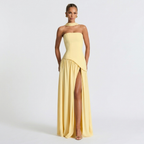 Front view of the Women's Wedding Guest Maxi Dress with a strapless bodice and high-split design in yellow, featuring a sleek strapless neckline, gathered waist, and flowing maxi-length skirt for effortless elegance. Designed by Bella Hudson.