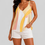 Front view of yellow abstract print cami top with chain straps and sleeveless design by BELLA HUDSON