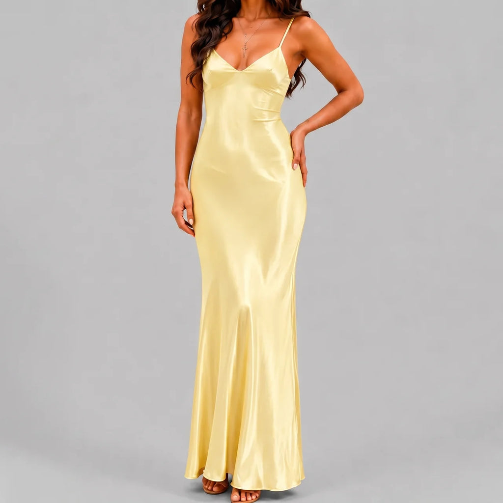 Front view of yellow satin maxi dress with spaghetti straps and bodycon silhouette by BELLA HUDSON
