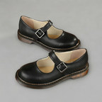 Front view of the Zayna Mary-Jane Flats Block Heels with Buckle Strap in Black featuring a classic closed-toe design, adjustable buckle strap, low block heel, and comfortable everyday fit by Bella Hudson.