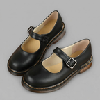 Pair view of the Zayna Mary-Jane Flats Block Heels with Buckle Strap in Black displaying the timeless Mary-Jane design, secure buckle strap, and durable low-profile sole by Bella Hudson.