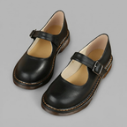 Side view of the Zayna Mary-Jane Flats Block Heels with Buckle Strap in Black showcasing a timeless Mary-Jane silhouette, secure buckle strap, cushioned footbed, and supportive low heel by Bella Hudson.