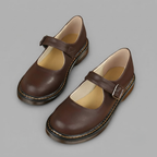 Zayna Mary-Jane Flats Block Heels with Buckle Strap in Brown featuring a classic closed-toe design, adjustable buckle strap, comfortable low block heel, cushioned footbed, and elegant silhouette shown in side view, designed by Bella Hudson.